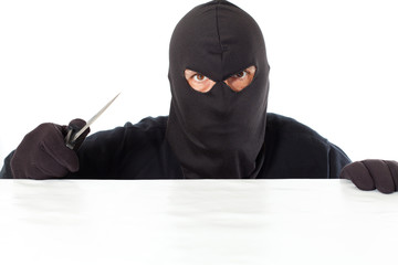 Thief with a knife