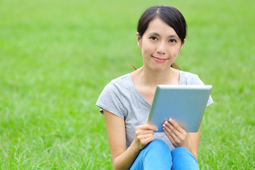 Fototapeta premium Asian woman with digital tablet