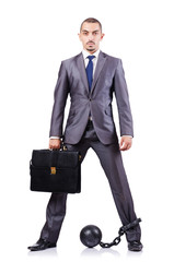 Businessman with shackles on white
