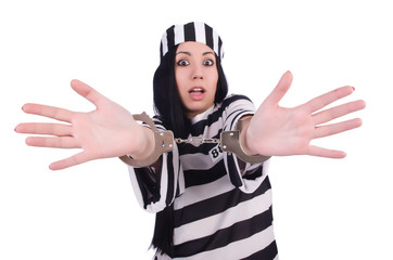 Prisoner in striped uniform on white