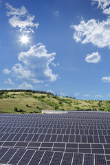 View of a solar photovoltaic cell panels under sunny sky, Macedo