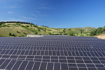 Solar photovoltaic cell panels under blue sky at Macedonia