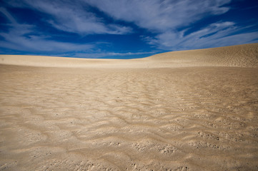 desert landscape, dunes, sky in the background
