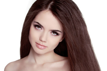 Beautiful Brunette Woman Portrait with healthy Hair. Clear Fresh