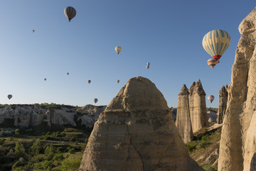 Fototapeta na wymiar hot air balloon trip at famous cave house Cappadocia Turkey
