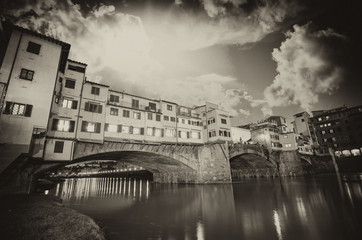 Florence, Italy. Wonderful sunset above Magnificent Ponte Vecchi