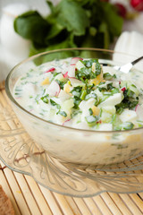 Okroshka in a large transparent bowl
