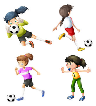 Four girls playing soccer