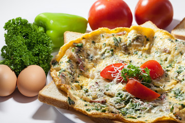 Fried eggs with tomato