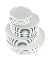 Pile of clean white dish plates isolated