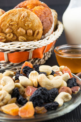 Fototapeta premium Nuts and dried fruits mix and baked peanut butter cookies