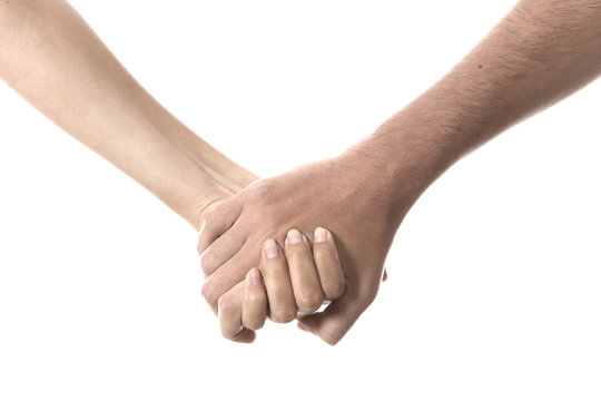 Model Released. Young Couple Holding Hands