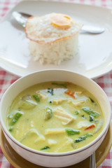yellow curry with tofu and fried egg,Thai menu