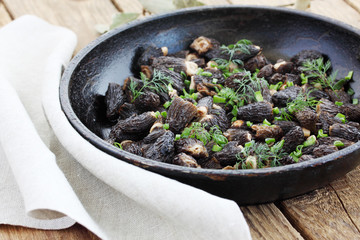 Morels mushrooms fried in a pan