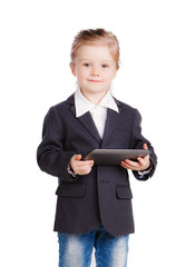 little girl in a business suit working on the tablet. isolation