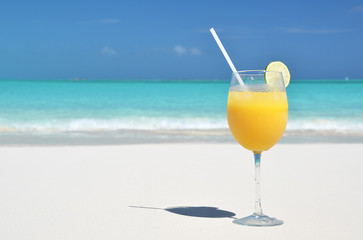 Orange juice on the beach. Exuma, Bahamas