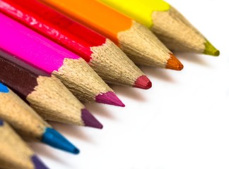 A group of different color pencils