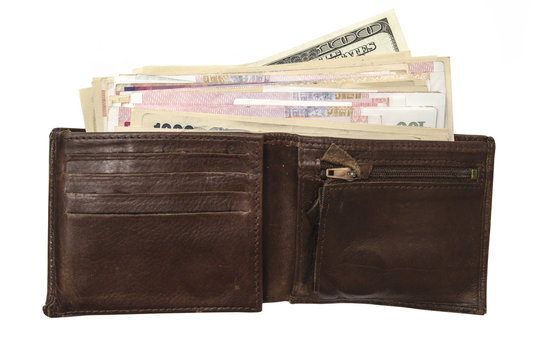 Brown wallet with currency on white background