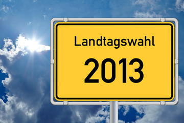 Schild Landtagswahl 2013 vor Himmel