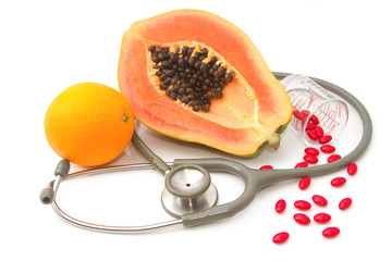 Pill and stethoscope with fruit ,Vitamin supplement and nutritio