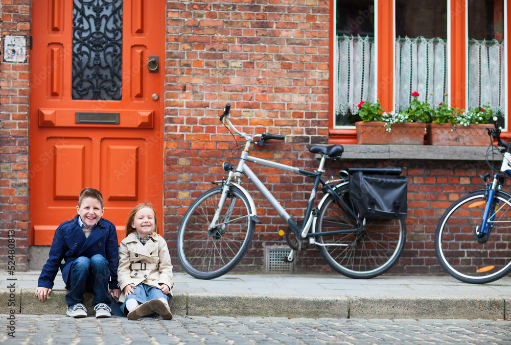 Sticker kids outdoors in city