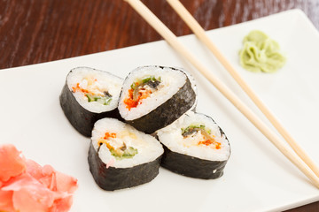 sushi with chopsticks