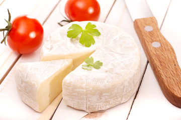 Brie on white table
