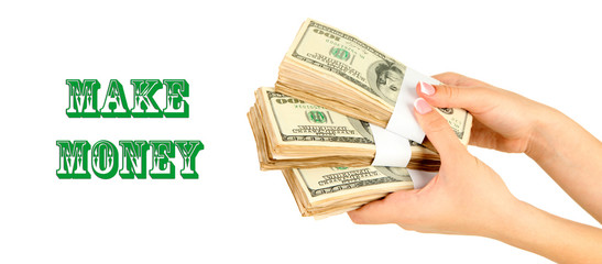 Female hand with dollars, close up, isolated on white