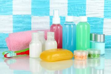 Hotel cosmetics kit on shelf in bathroom