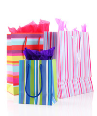 Striped shopping bags isolated on white