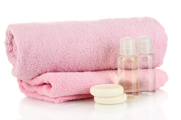 Plakat Hotel cosmetic bottles with towel isolated on white