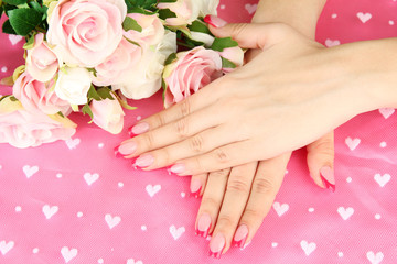 Fototapeta premium Closeup of hands of young woman with elegance manicure,