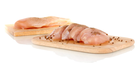 Chicken meat on board isolated on white