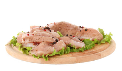 Chicken meat on board isolated on white