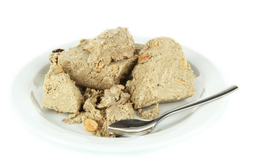 Tasty halva on plate isolated on white