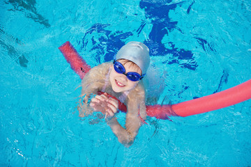 happy children group  at swimming pool