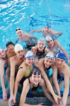 happy teen group  at swimming pool