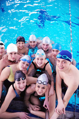 happy teen group  at swimming pool