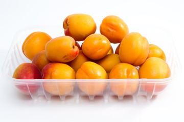 Apricot fruits packged on supermarket plastic pack