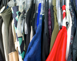 Clothing, red shirt on right