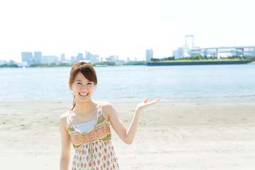 Beautiful asian woman on beach summer holiday