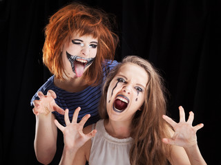 Halloween face art on black background
