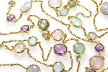Closeup photo of jewelry with natural colorful gemstones.