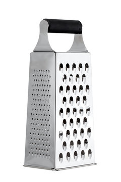 The kitchen metal grater is isolated on a white background