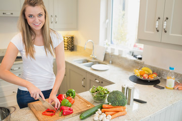 Woman chopping vegetable