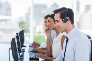 Smiling agent working in a call centre