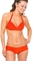 Obraz premium Portrait of laughing young woman in swimsuit