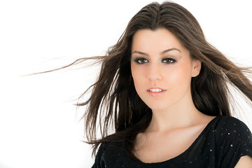 Beautiful woman with long brown hair.Pportrait of a fashion mode