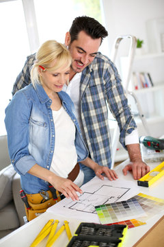 Couple designing home interior project