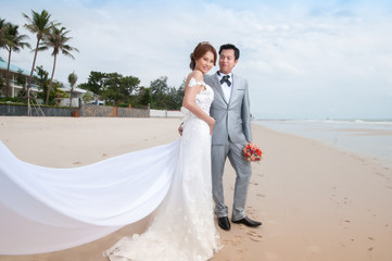 Fototapeta na wymiar groom and bride embrace